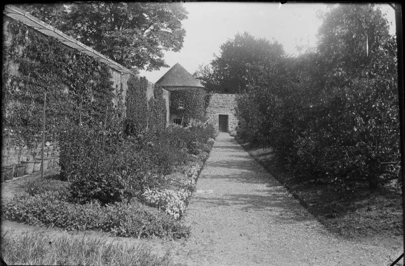 [Pathway, kitchen garden. Apple room at end of path.]