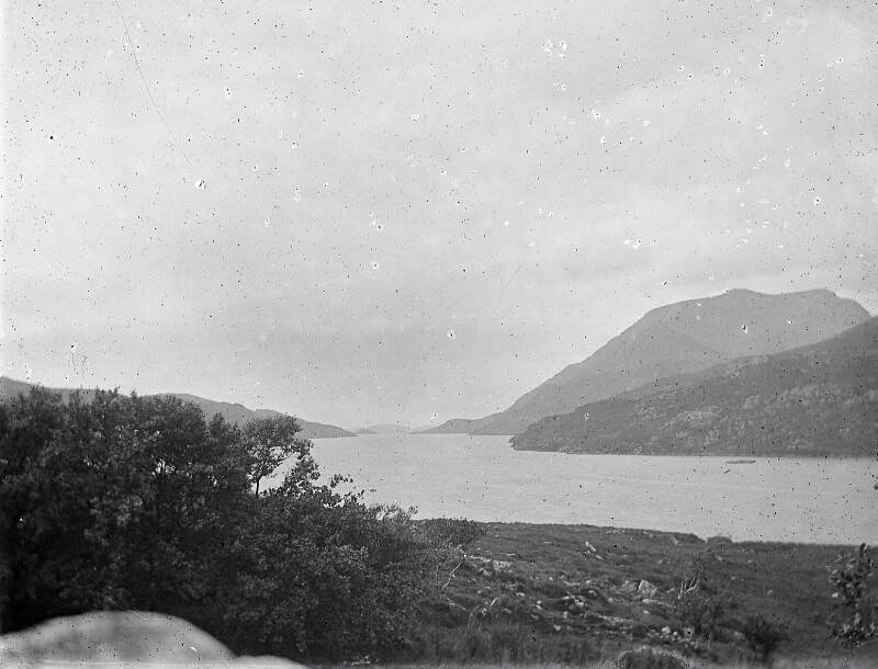 [Connemara E.L.D. Mountains inlet with gorse growing in foreground.]