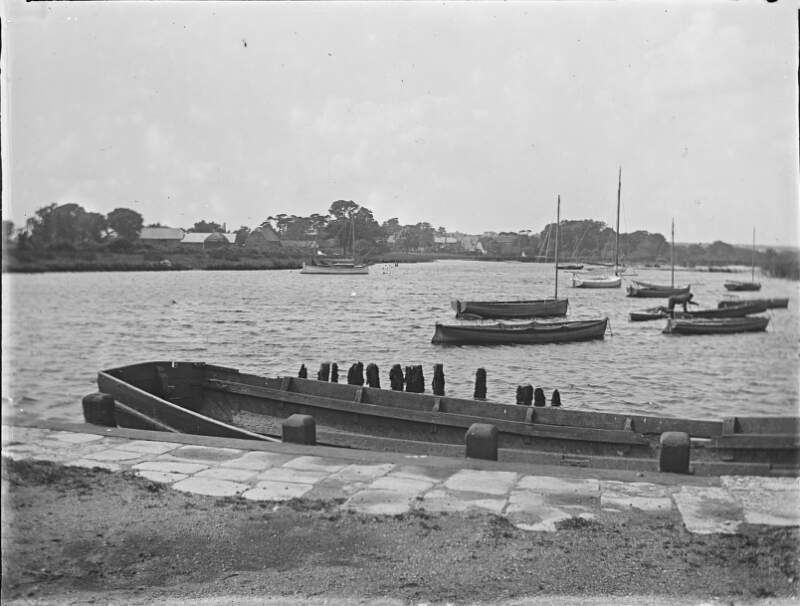 [Boats moored at a small harbour. Boxhill/Christ Church marked on envelope.]