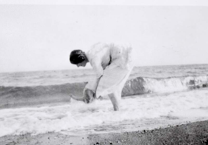 [Muriel Gifford MacDonagh dipping Barbara MacDonagh into the sea, at Greystones, County Wicklow]