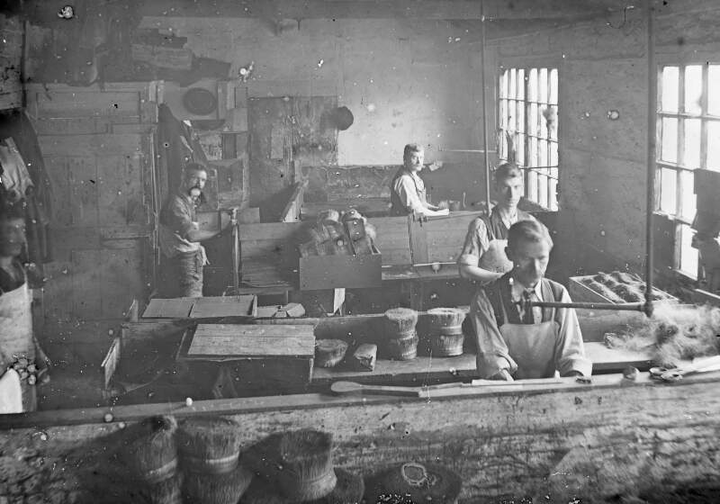 Varians Brush Factory. 48: Four men at work.