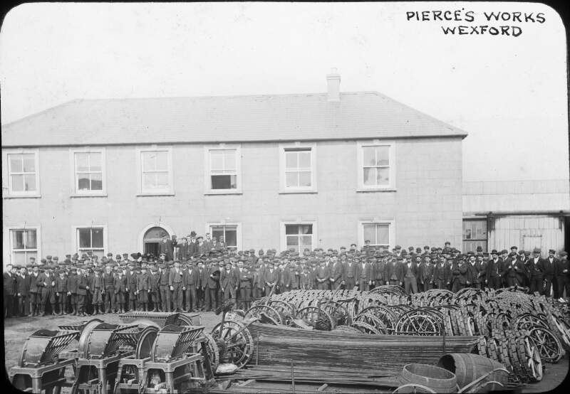 Pierce's of Wexford - external shot, workers, equipment to fore.
