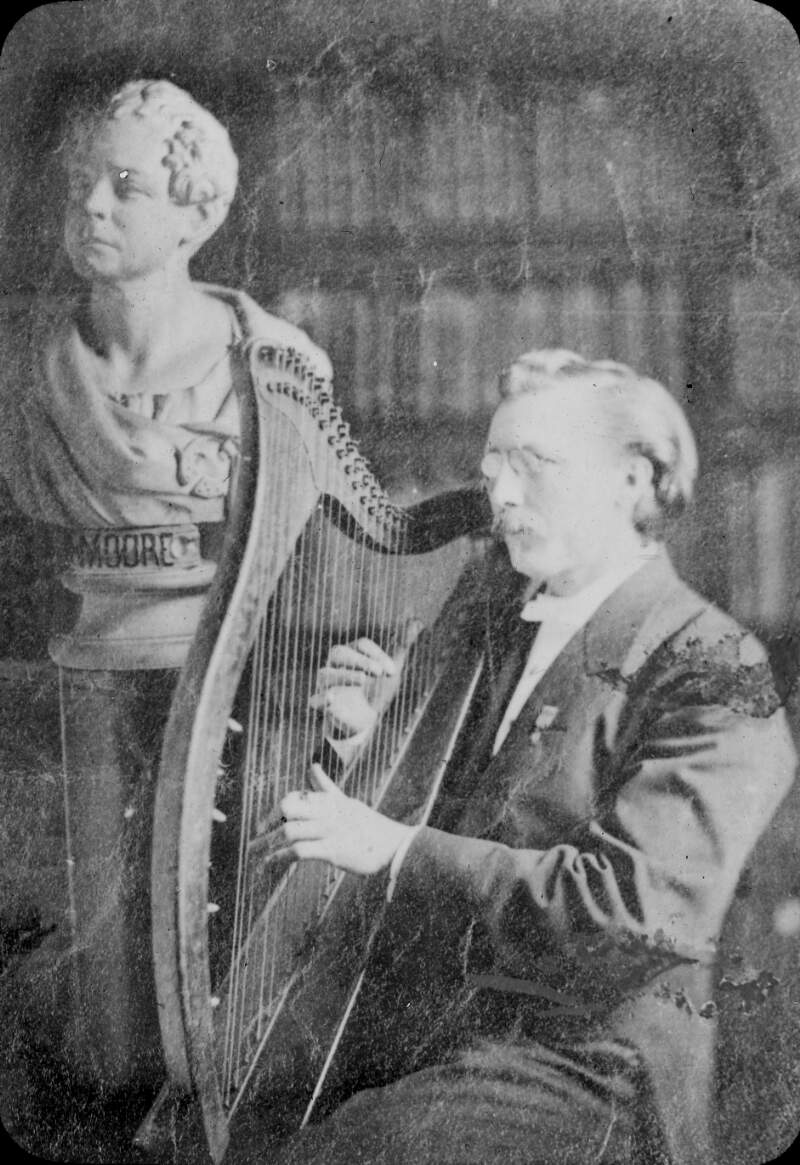 Young male harpist, Victorian or early Edwardian.