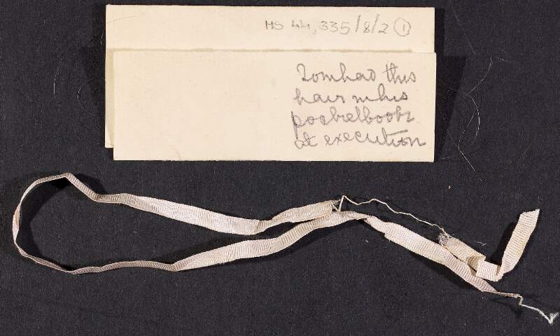 Lock of Barbara MacDonagh's blonde hair tied together with ribbon and a note written by Mary MacDonagh, Sister Francesca, explaining it had been found on Thomas MacDonagh subsequent to his execution,