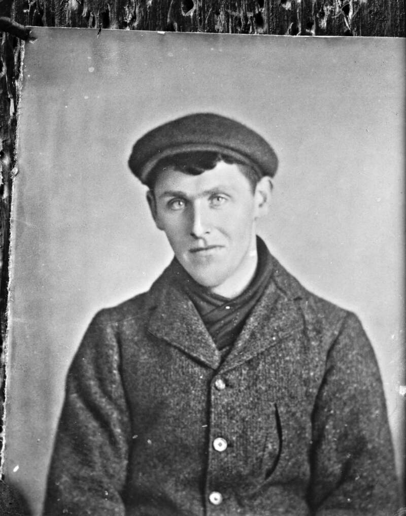 Young man wearing a cap, head and shoulders portrait : commissioned by Mrs. W. Flynn, Carbally, Dunmore East