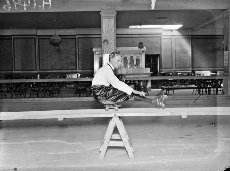 Man performs skating trick