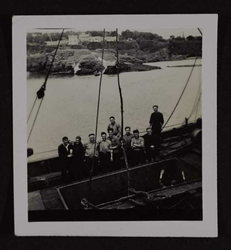 [Boat and crew docked at Dunmore East Harbour],