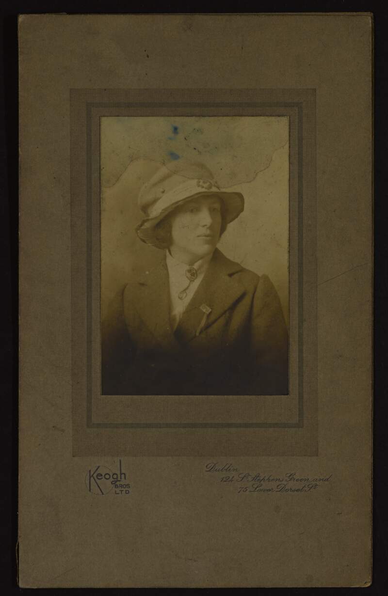 [Portrait of Áine Ceannt with a 1916 remembrance pin],