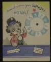 Birthday card from Rónán Ceannt to 'Mary' decorated with small rotating wheel to spin for a birthday wish,