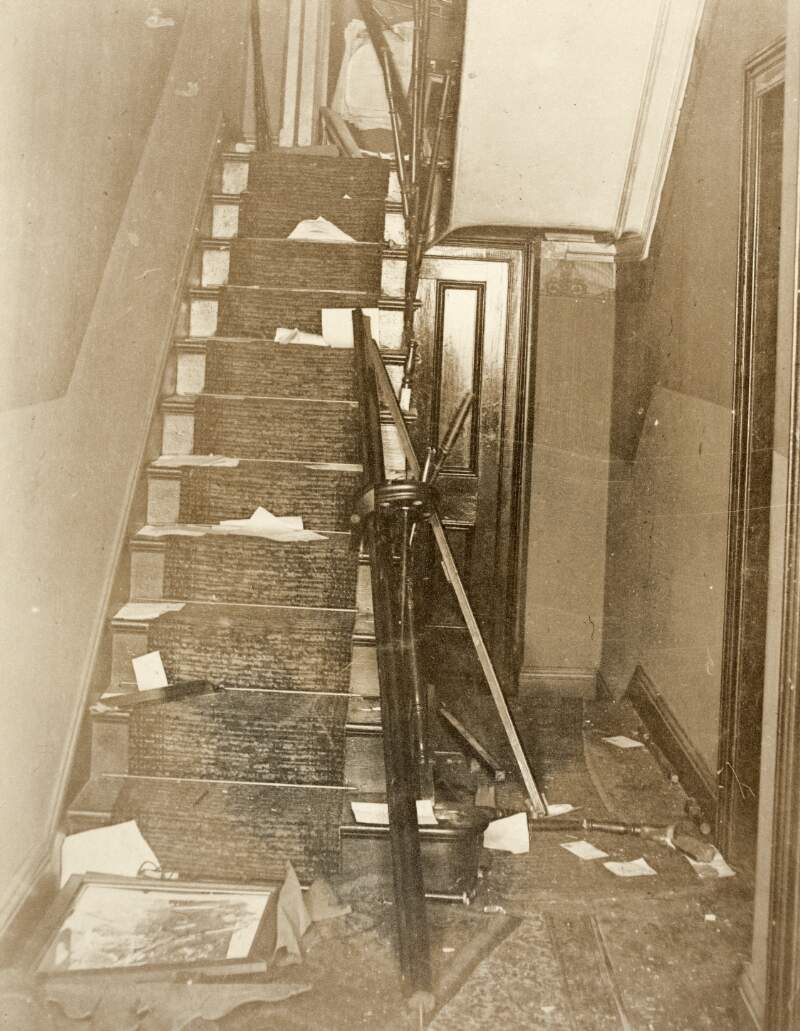 [Damaged staircase in Áine Ceannt's home on Oakley Road following a raid by Free State forces]