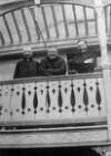 [Fr. Senan and two others in religious vestments, looking down from balcony]