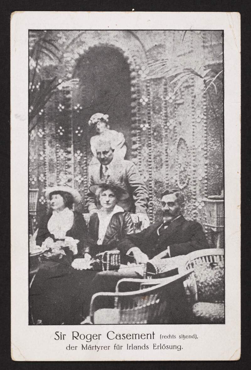 Blank postcard titled 'Sir Roger Casement (rechts sitzend) / der Martyrer fur Irlands Erlosung',
