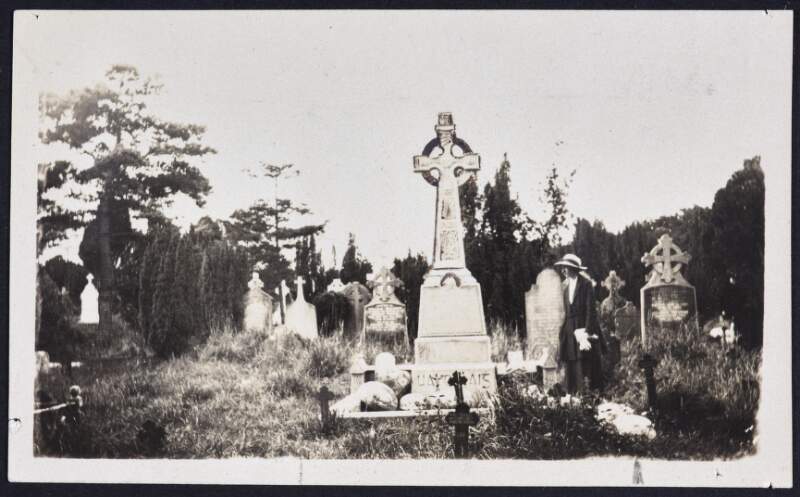 [Photograph of Nora Dore at John Daly's grave]