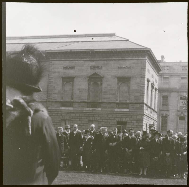 [Negative of crowd in front of large building]