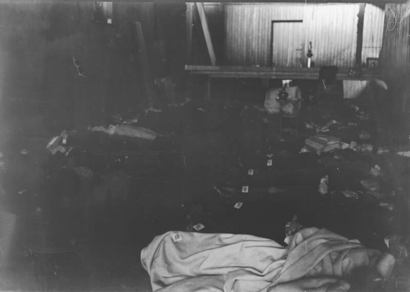 Lusitania disaster, Cobh, Co. Cork : bodies laid out, with numbered tags, in large room]