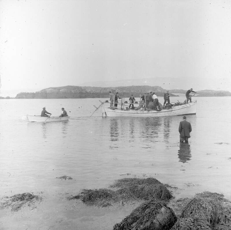 [Men in fishing boats laying a submarine cable to Arranmore Island, Co. Donegal]