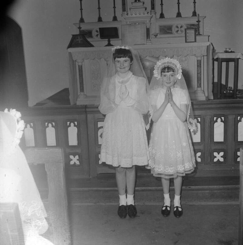 [Girls at a church altar for communion, Arranmore, Co. Donegal]