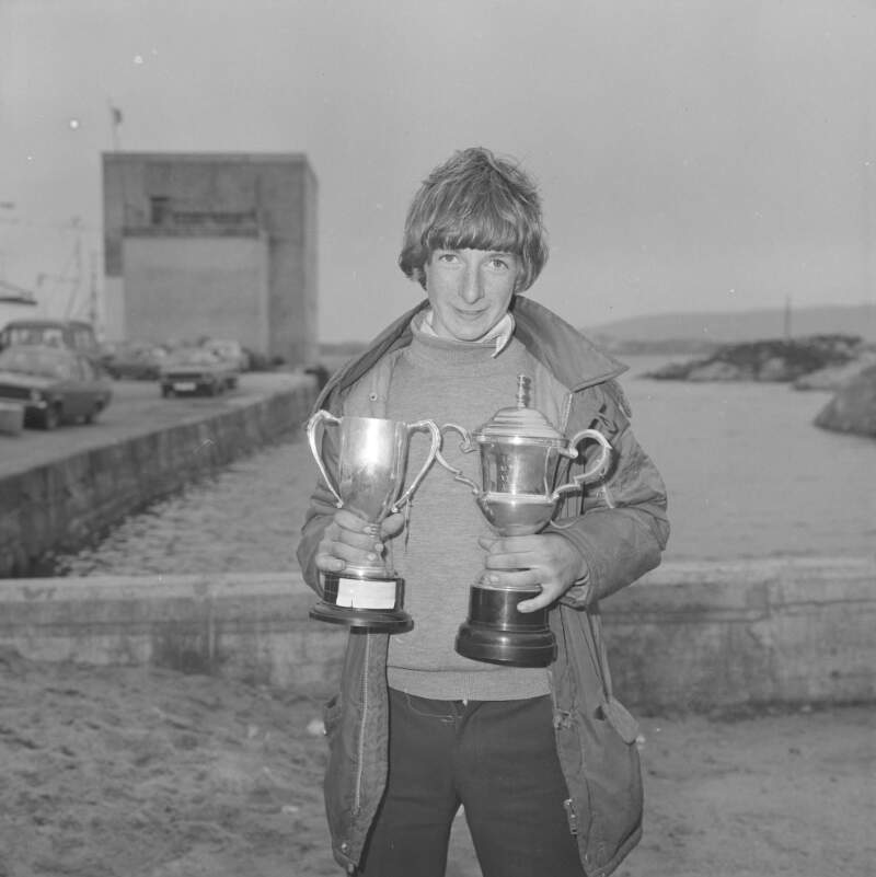 [Angler with trophies, Burtonport, Co. Donegal]