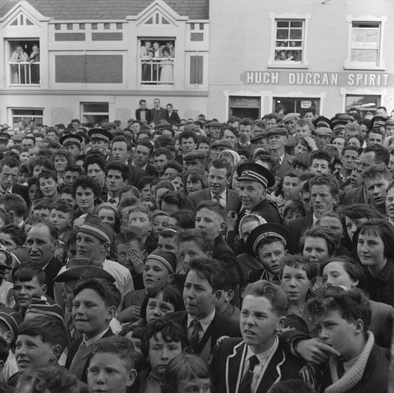 [Crowd watching  fife and drum band, Dungloe, Co. Donegal]