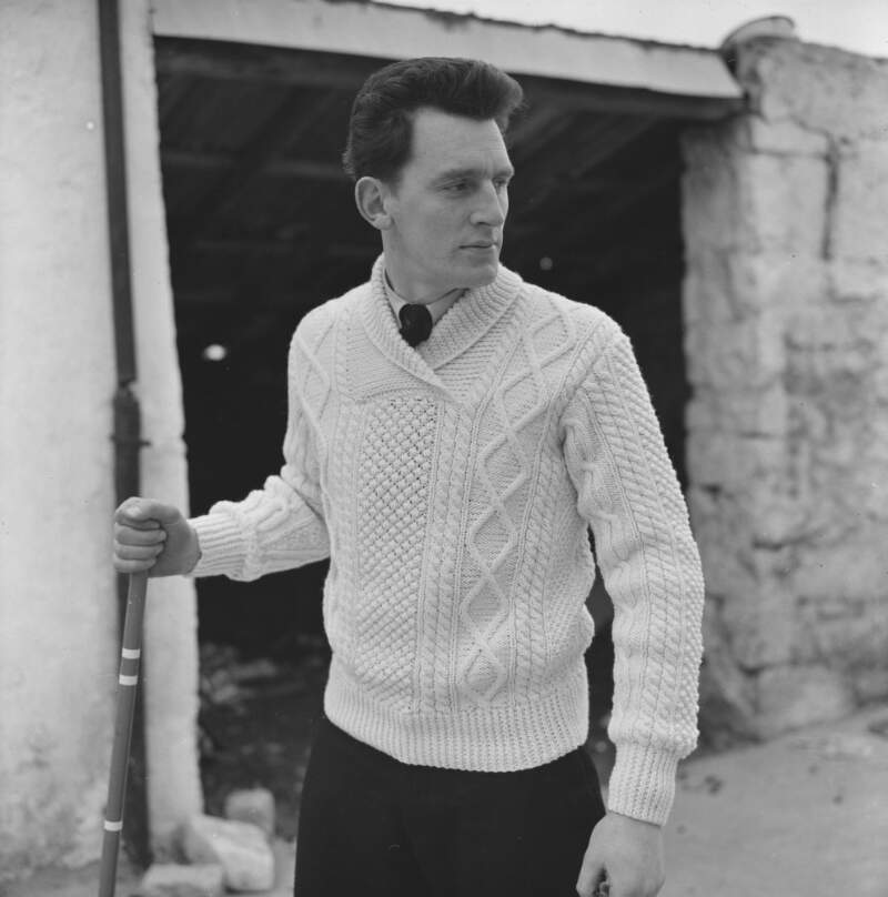 [Male modelling garments for Dungloe Co-op knitting, Co. Donegal]