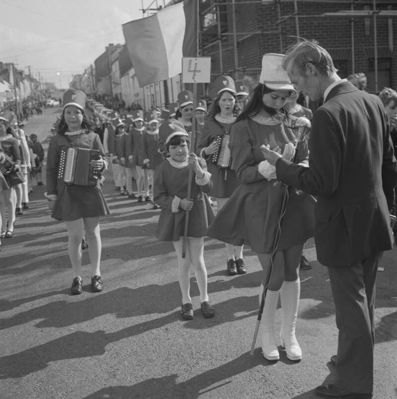 [Band marching and playing musical instruments at the Easter Parade in Dungloe, Co. Donegal]