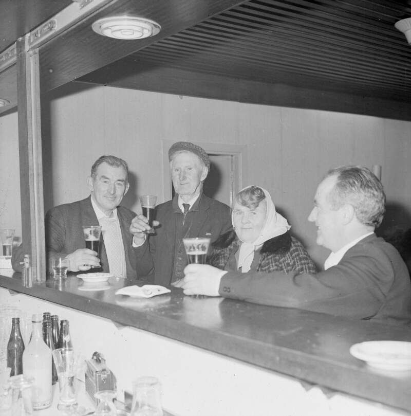 [Men and woman at a party in Glenties, Co. Donegal]