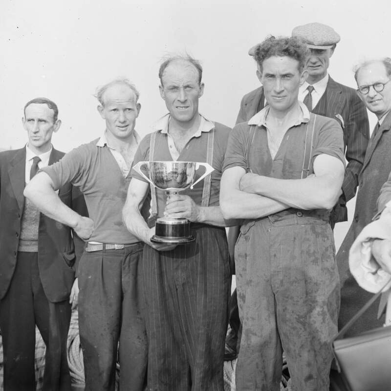 [Men with trophy, Kincasslagh, Co. Donegal]