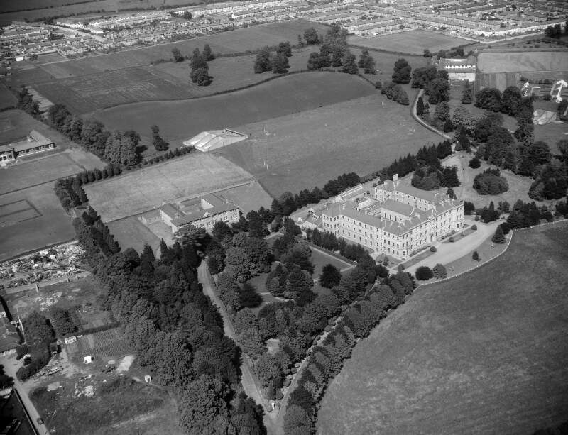 [Aerial photograph of a school and religious complex]