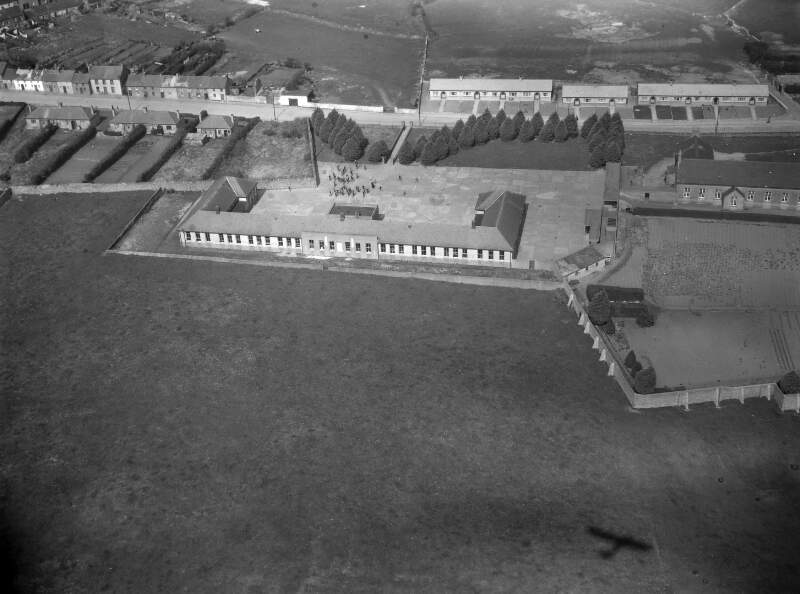 [Aerial photograph of a hospital or school]