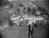 [Aerial photograph of a convent and school complex]