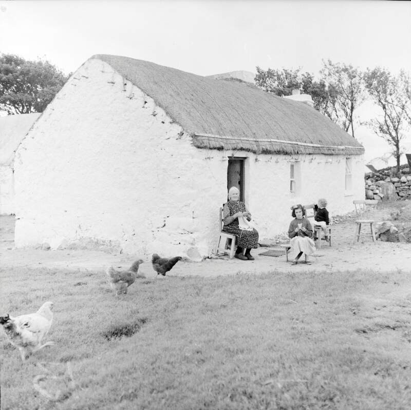[Women in front of cottage, Lettermacaward, Co. Donegal]
