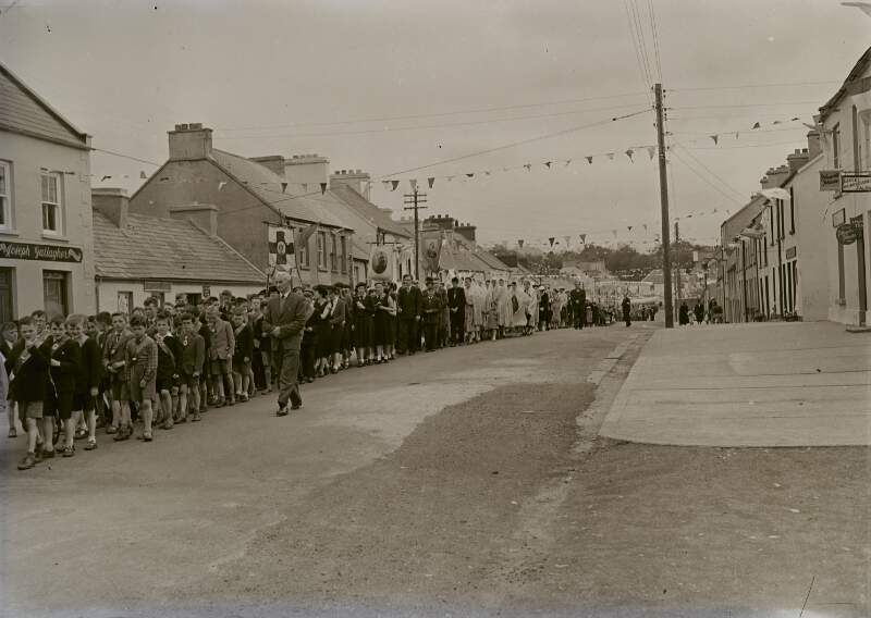 [Children and adults in procession with religious banners, Glenties, Co. Donegal]