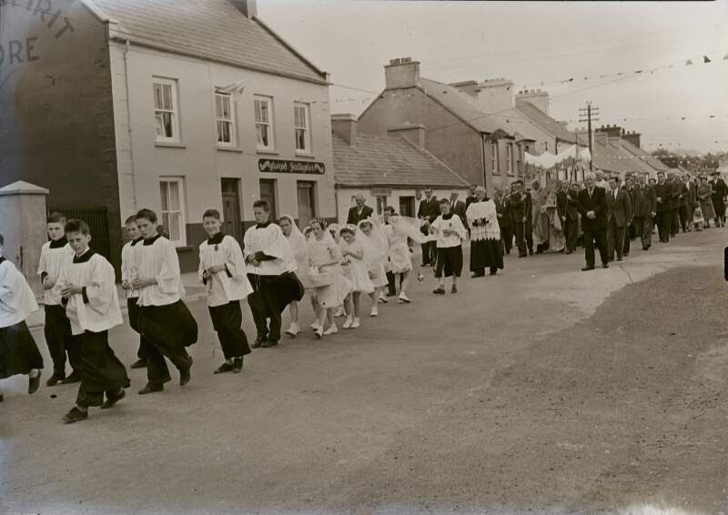 [Altar boys leading procession, Glenties, Co. Donegal]