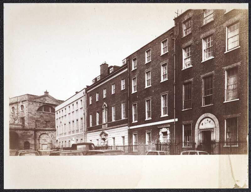 [Row of buildings on Henrietta Street, with King's Inns at the end]