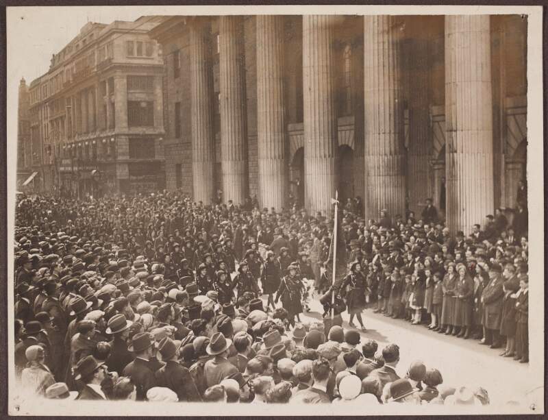[Cumann na mBan marching in uniform past the G.P.O.]