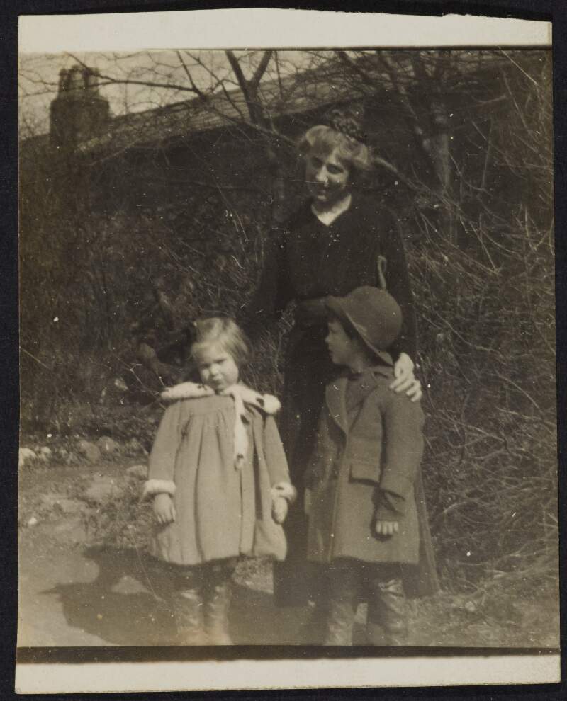 [Unidentified woman with young girl and boy]
