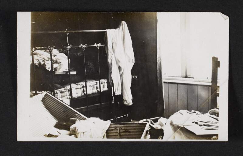[Bedroom in Jane Coffey's house following a military raid]
