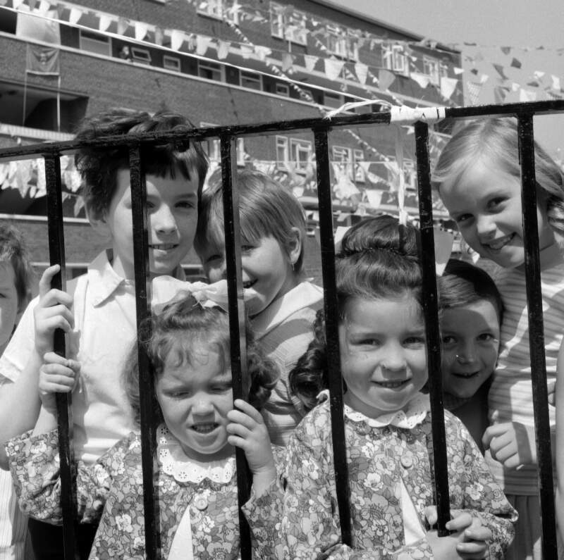 [Children near block of flats, Corpus Christi feast-day, Coleraine Street, Dublin]