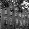 [Fanlights and upper storeys of houses, Lower Baggot Street, Dublin]