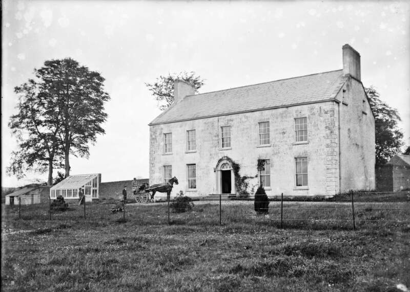 [Horse and cart in front of house, Ireland]
