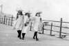 [Three girls walking along Bray seafront]