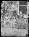 [Elderly couple, possibly estate workers, outside the photograph House, Clonbrock, Co.Galway]