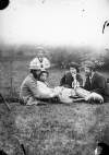 [Augusta Caroline Dillon seated on the lawn with two men, possibly her brothers and two children one of which is Ernest Chichester]