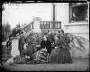 [Group, including Dillon sisters, gathered at steps outside Clonbrock House, Co.Galway]