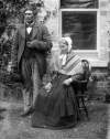 [Portrait of an elderly couple, possibly servants, outside the photograph house, Clonbrock, Co.Galway]