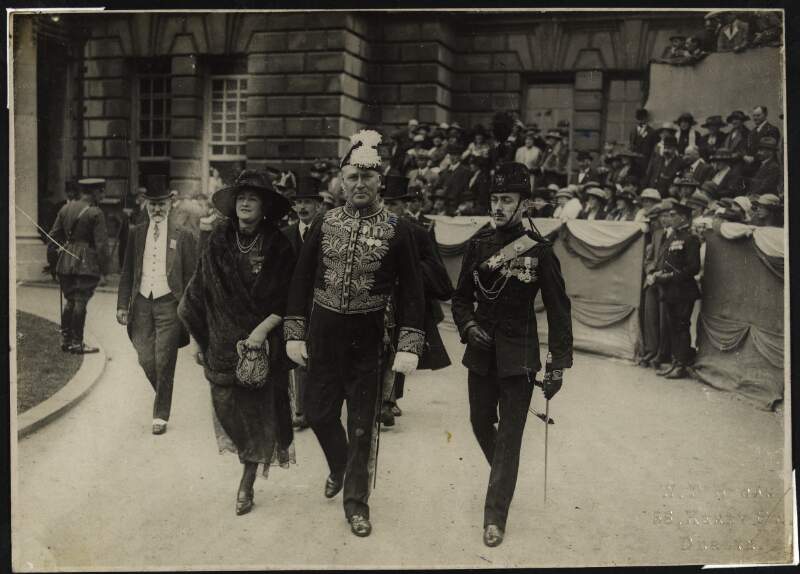 [Sir Hamar and Lady Margery Greenwood arriving for the opening of the Ulster parliament]