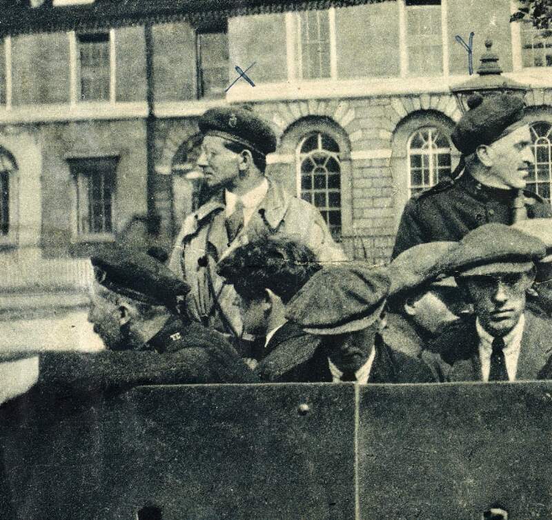 [Cadets Richard Dentith and James Hart Waddingham of the Auxiliaries 'F' Company : pictured in an army vehicle with five unidentified individuals ]