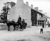[Jaunting car, with tourists, departing from outside the Lake Hotel, Inchigeela, Co. Cork]