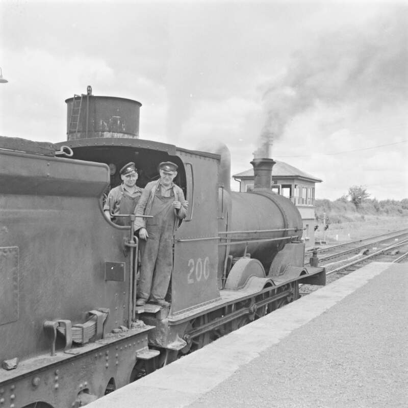 Drivers on train passing, Enfield, Co. Meath.