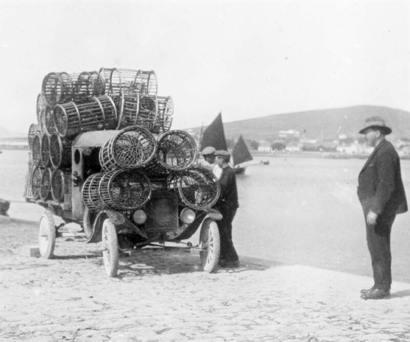 Valentia: confiscated lobster pots. Harbour in background.